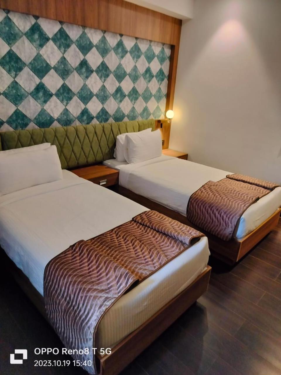 Mandarin Sky Hotel Kannur Bagian luar foto