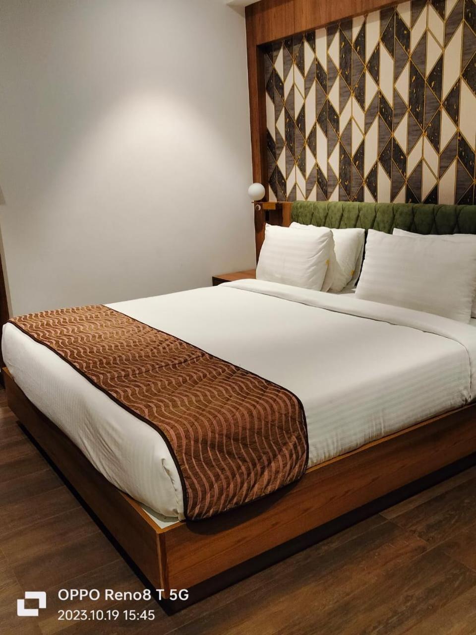 Mandarin Sky Hotel Kannur Bagian luar foto